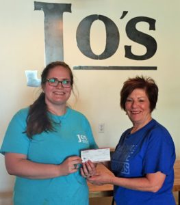 Belle Baker of Jo's Downtown presented Rita Floyd, Program Director of CASA of Titus, Camp and Morris Counties with a check in the amount of $1,000. Jo's donated $2 for every BLUEberry muffin sold, with a matching donation from a friend of Jo's Downtown, if 250 blueberry muffins were sold by the end of the month.